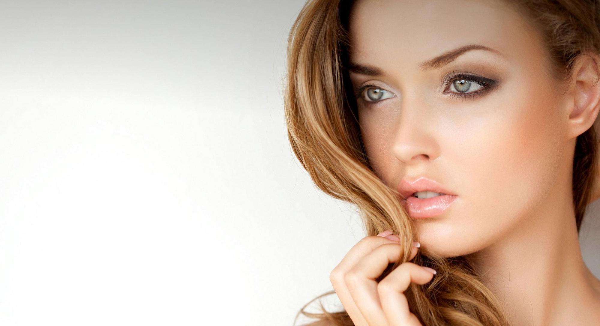 Charlotte plastic surgery model with blue eyes